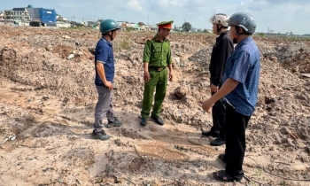 Bắt quả tang hai doanh nghiệp đổ khoảng 12.000m³ chất thải xây dựng vào khu đất dự án